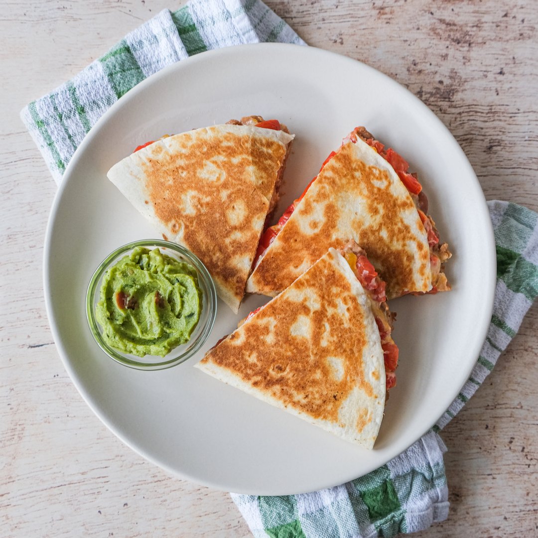 Ultra Easy Vegetarian Refried Bean Quesadilla with Tomato & Guacamole