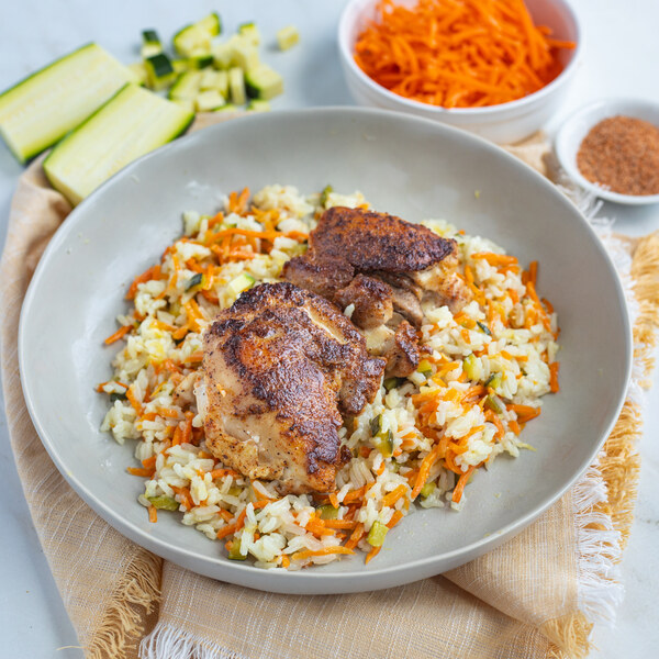 Pan-Fried Cajun Chicken Thighs with Zucchini & Carrot Rice Pilaf | Vons