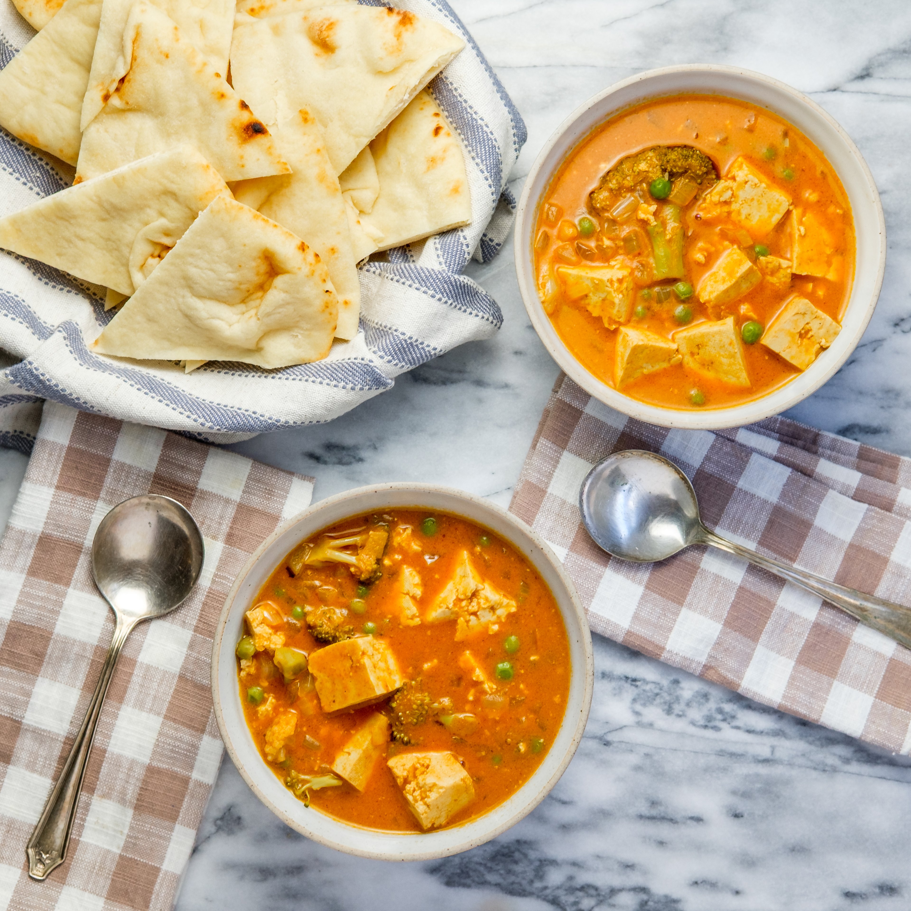 Easy Slow Cooker Vegan Tofu Tikka Masala with Mixed Veggies & Naan