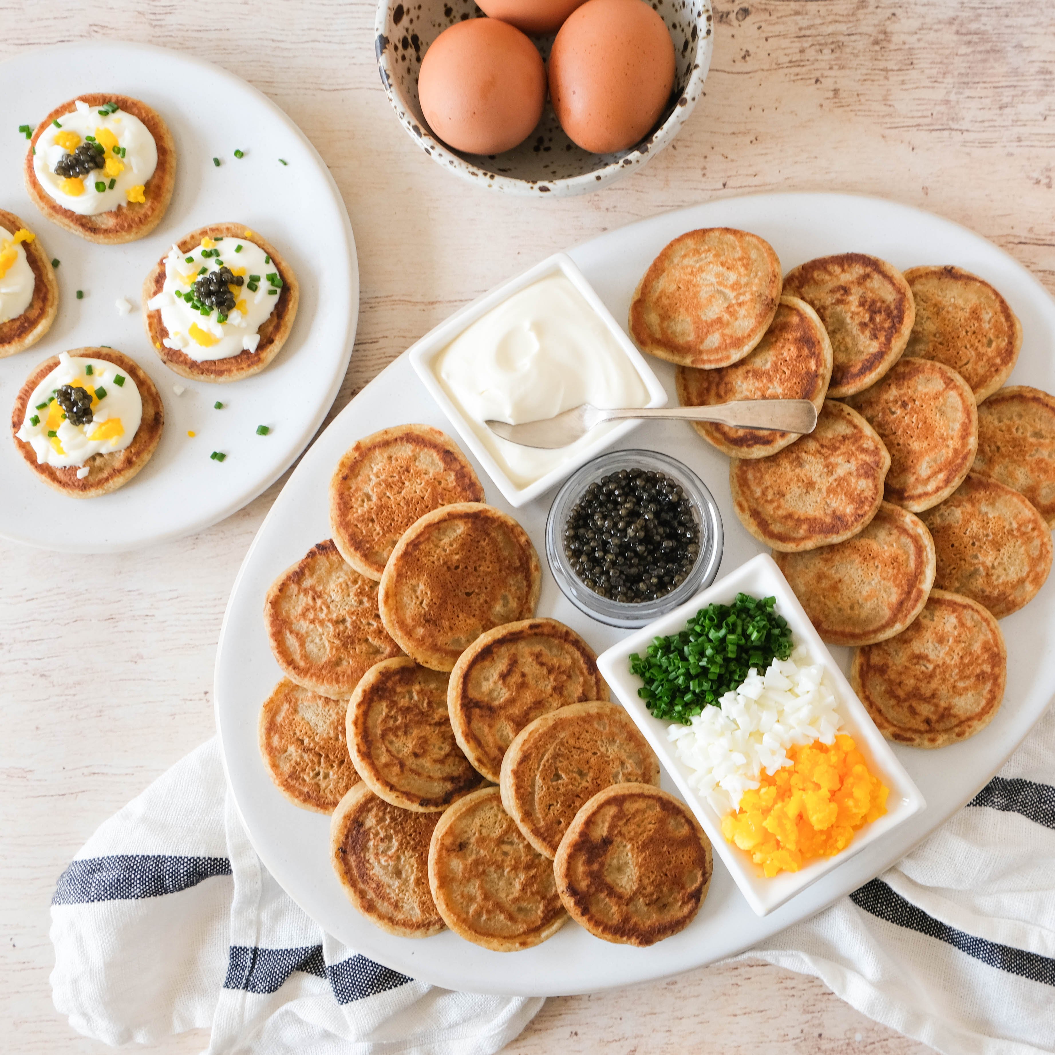 Homemade Blinis with Crème Fraîche, Caviar, Egg & Chives