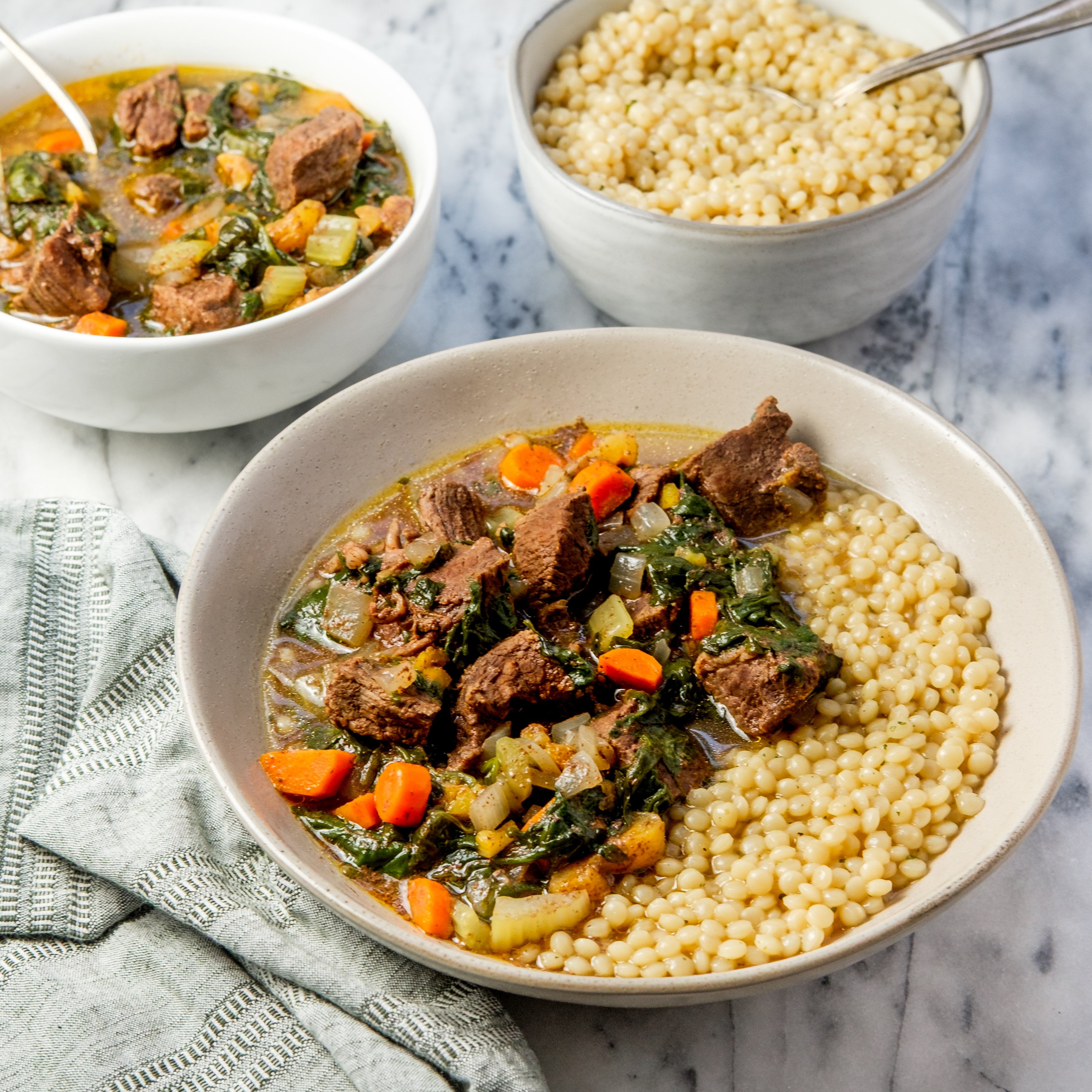 Easy Slow Cooker Moroccan Beef Stew with Spinach, Apricots & Pearled Couscous
