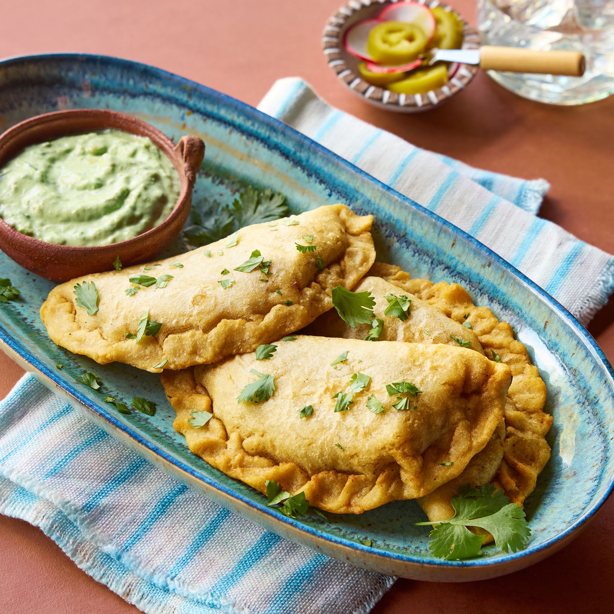 Salsa Verde Ground Beef & Potato Empanadas with Avocado Dipping Sauce by Herdez® 