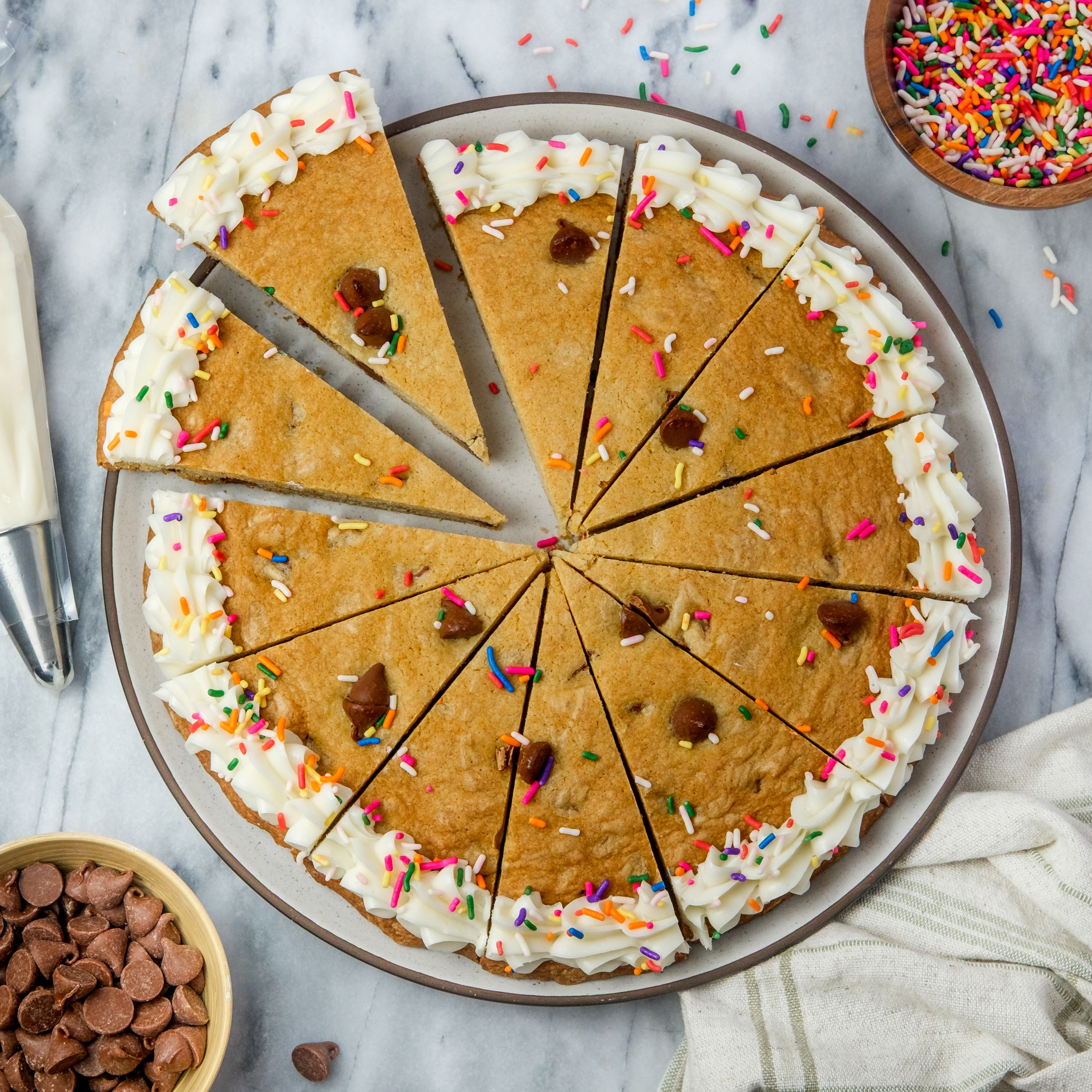 Giant Chocolate Chip Cookie "Cake" with Vanilla Frosting