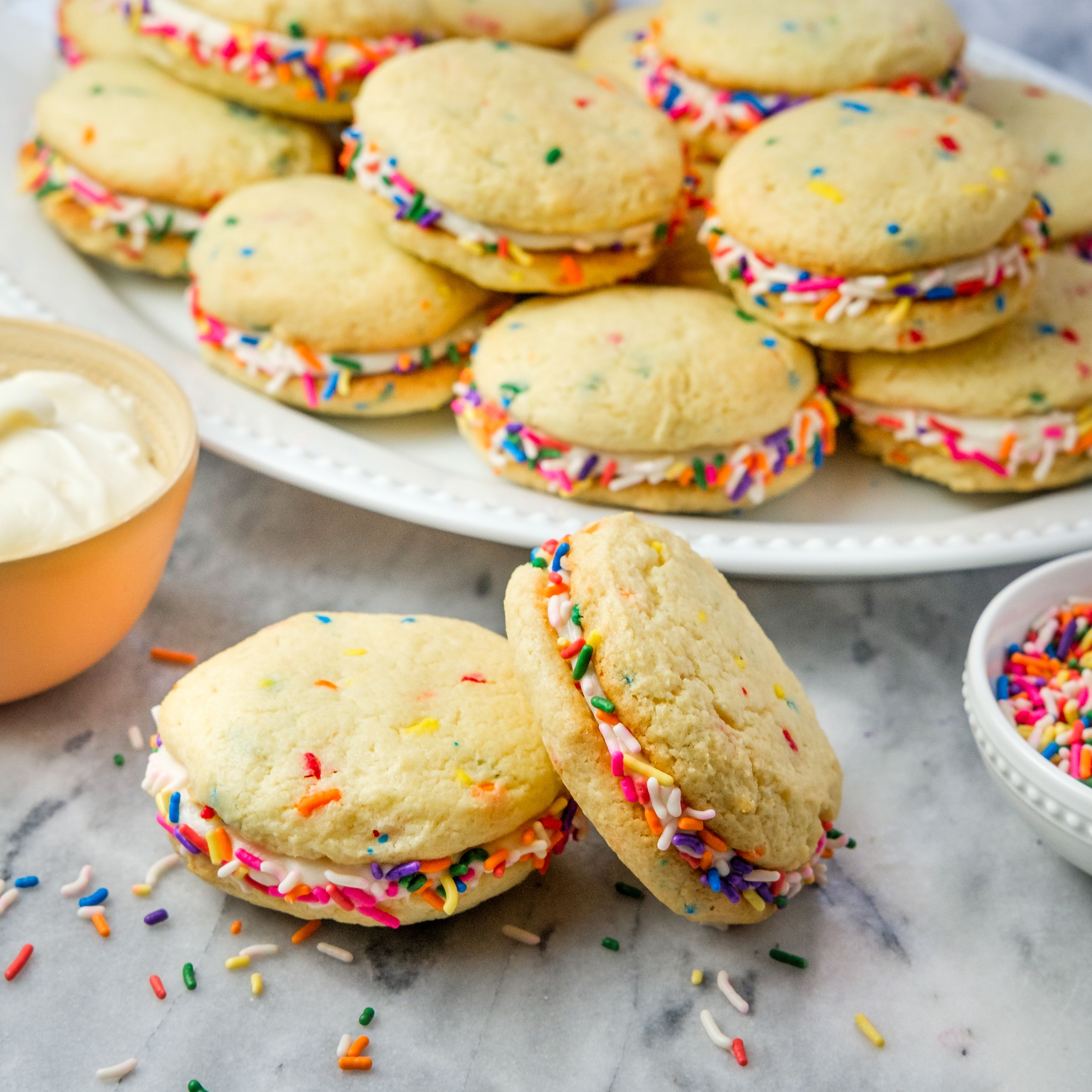 "Confetti Cake" Sandwich Cookies with Vanilla Icing & Sprinkles