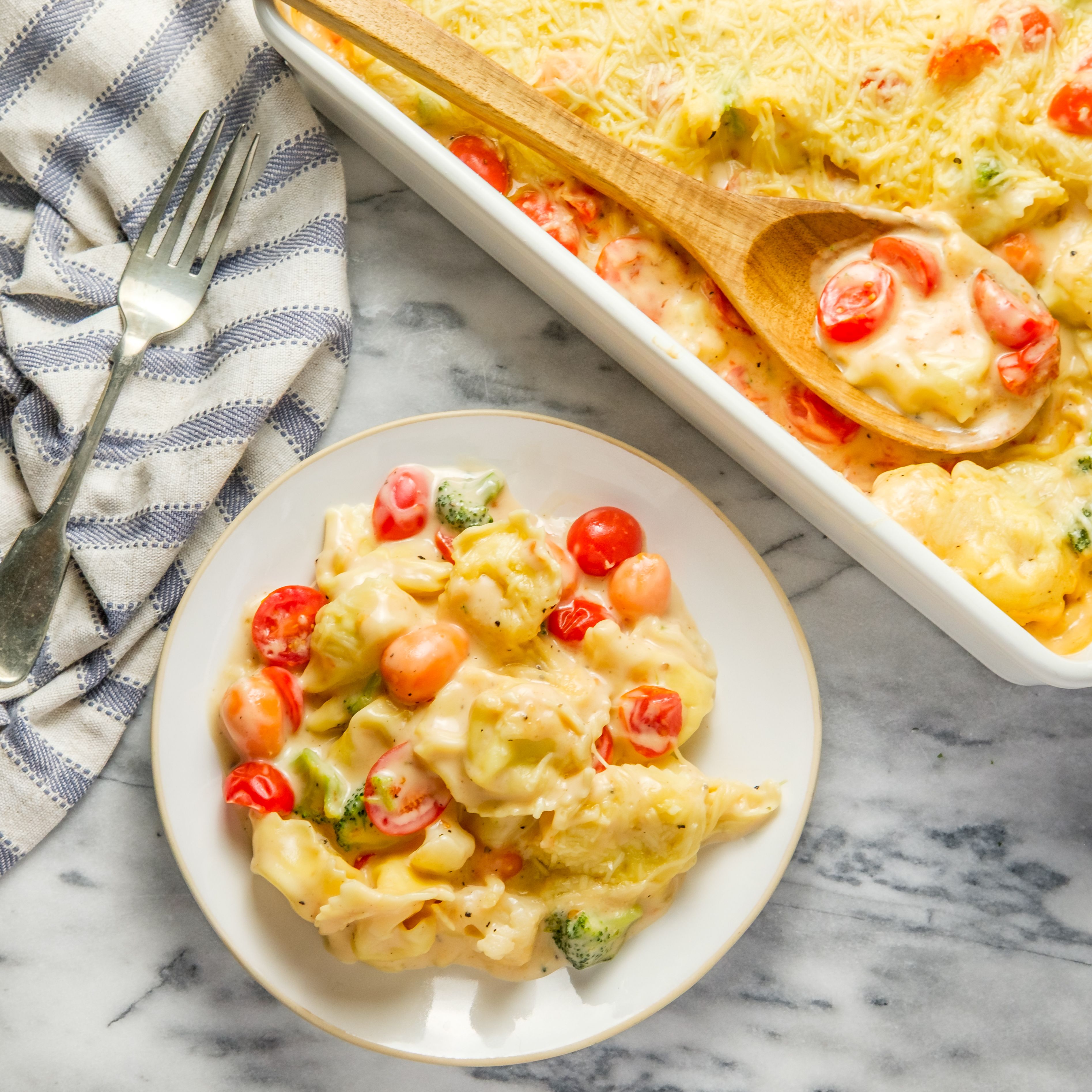 Easy Tortellini Alfredo Bake with Broccoli, Cauliflower, Carrots & Tomatoes
