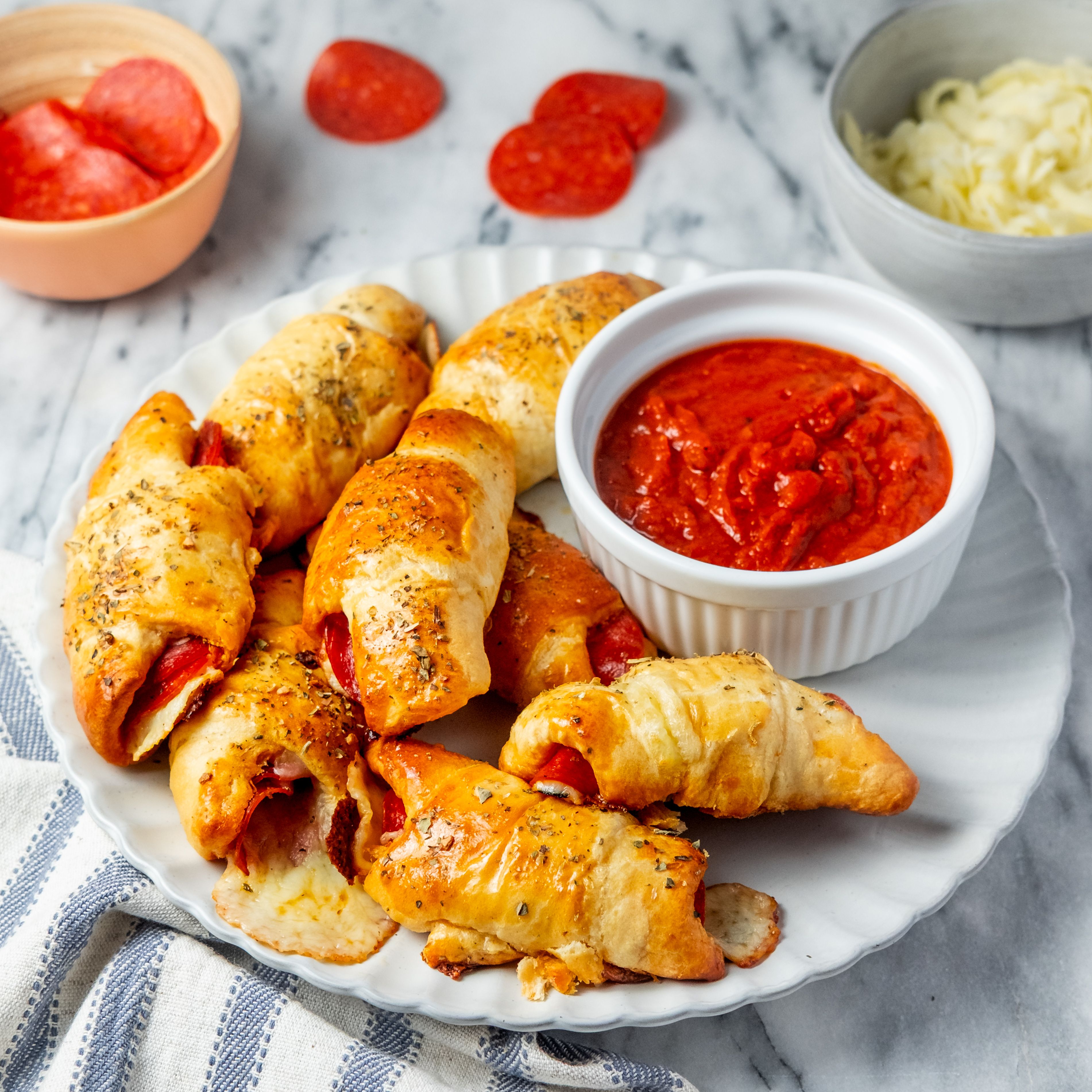 Cheesy Pepperoni Crescent Rolls with "Pizza" Dipping Sauce