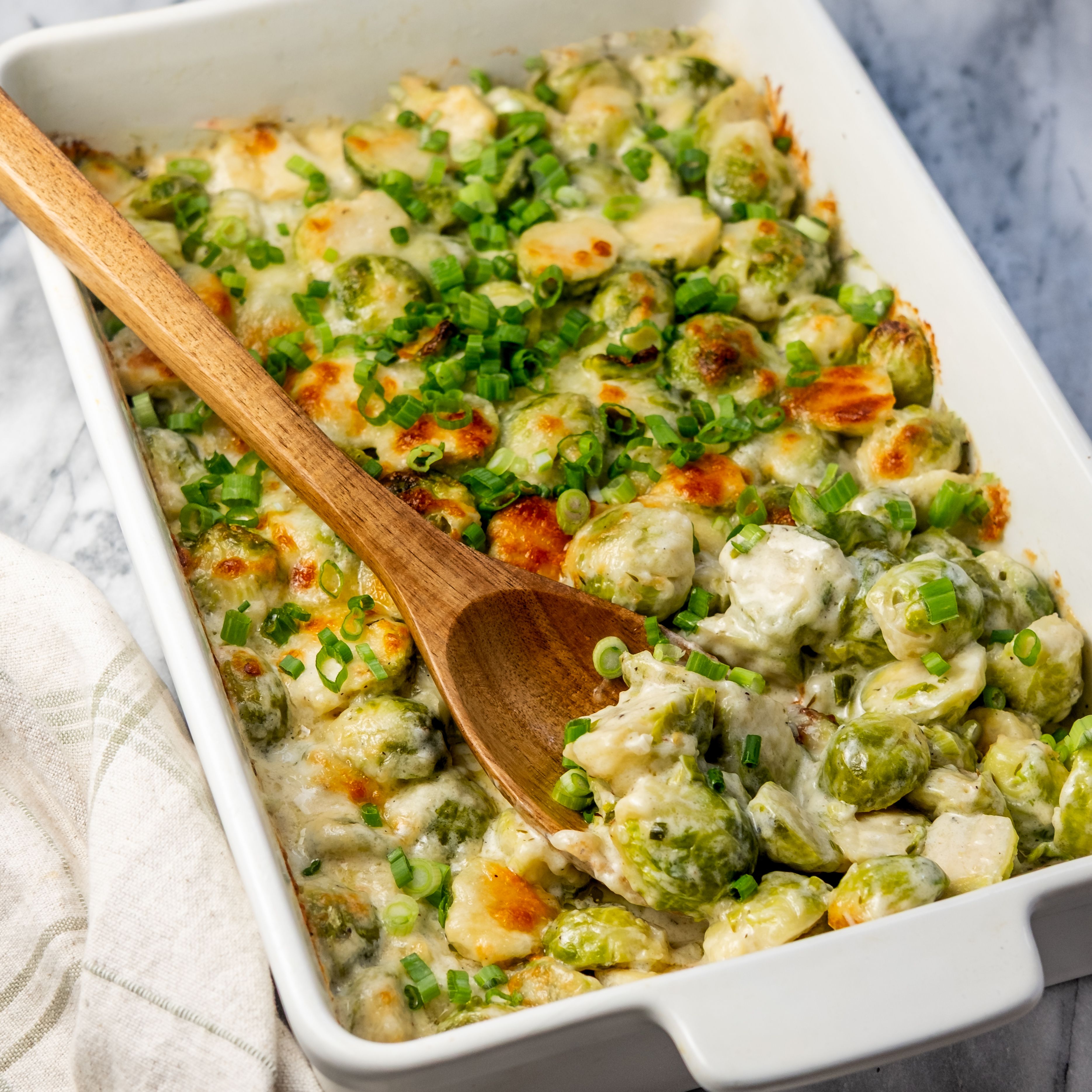 Creamy Baked Brussels Sprouts with Sharp White Cheddar Cheese