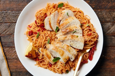 Charred Lemon Chicken over Sun-Dried Tomato Pasta