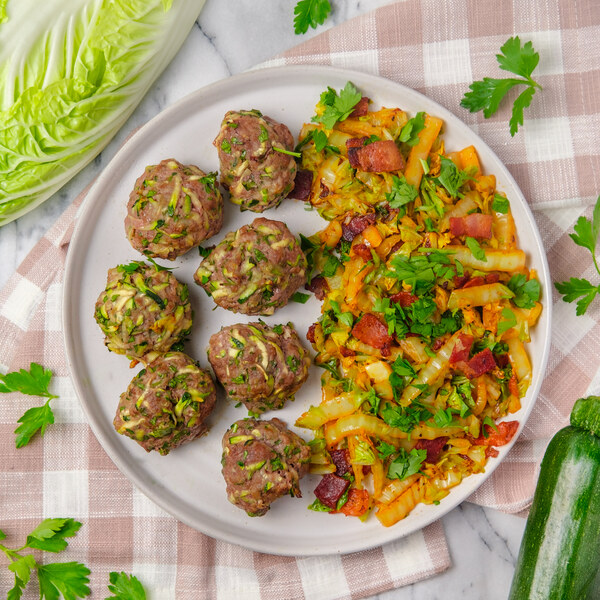 Baked Beef & Zucchini Meatballs with Smoky Bacon-Fried Cabbage