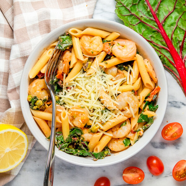 Shrimp Penne with Swiss Chard, Tomatoes, Mint, Pistachios & Parmesan