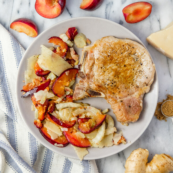Seared Coriander Pork Chop with Roasted Plum, Fennel & Parmesan Salad
