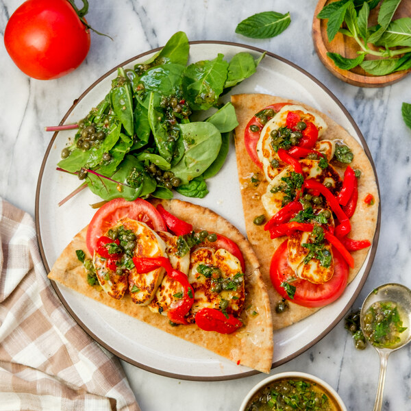 Open-Faced Pita with Halloumi, Tomato, Mint-Caper Dressing & Greens