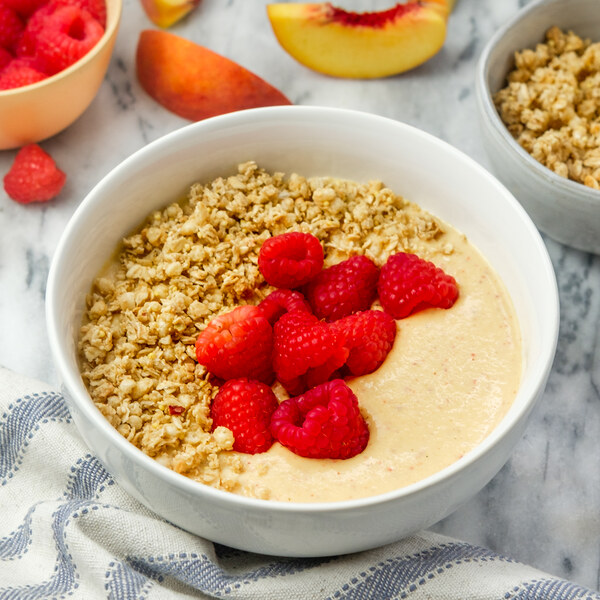 "Peach Melba" Smoothie Bowl with Almond Butter, Raspberries & Granola