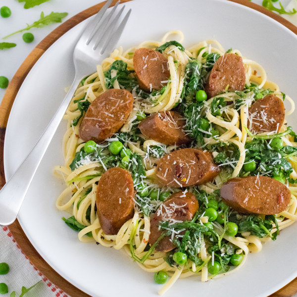 Cacio e Pepe Pasta with Veggie Sausage, Arugula & Peas