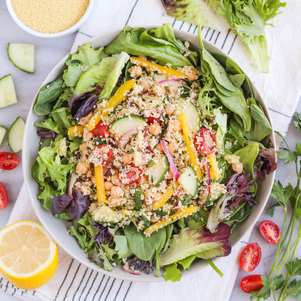 Couscous Greek Salad over Spring Greens