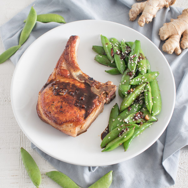 Cinnamon-Ginger Spiced Pork Chops with Sesame Snap Peas