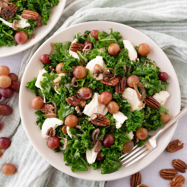 Tender Kale Salad with Mozzarella, Balsamic-Roasted Grapes & Pecans