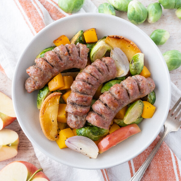 Hasselback Sausage over Maple-Roasted Apples, Brussels & Squash