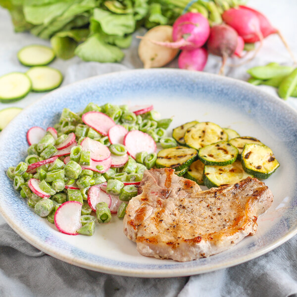 Grilled Pork Chop & Zucchini with Snap Pea-Radish Salad