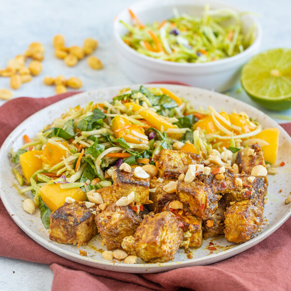 Spicy Peanut Tofu Stir-Fry with Bok Choy, Mango & Broccoli Slaw