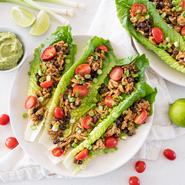 Chicken Taco Salad Boats with Black Beans, Tomato, Guacamole & Lime