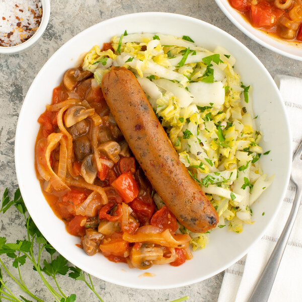 Vegan Sausage, Tomato & Mushroom Bake with Sautéed Cabbage