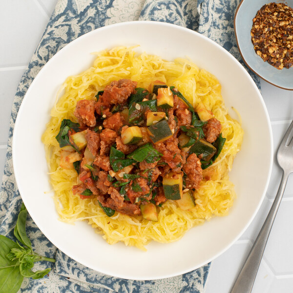 Veggie Ground, Zucchini, Spinach & Basil Ragù over Spaghetti Squash