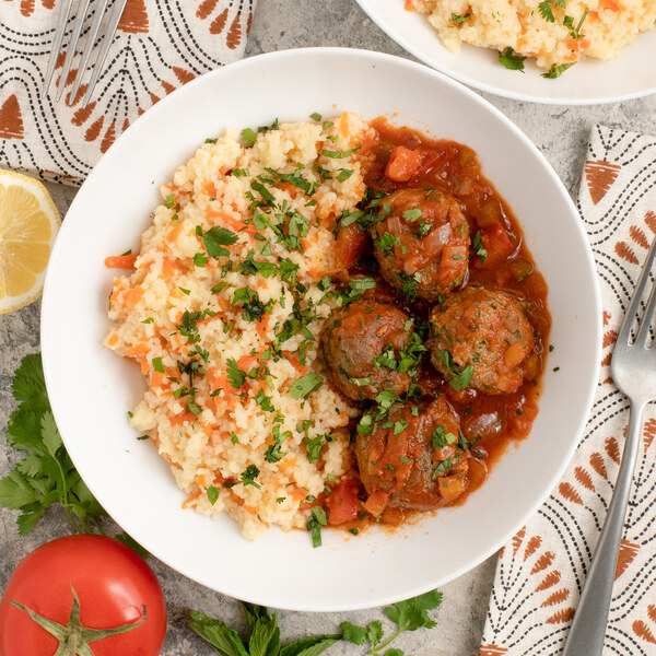 Moroccan-Style Veggie "Meatball" Stew with Carrot Couscous & Herbs
