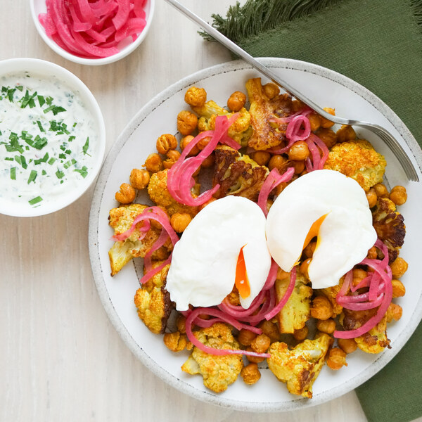 Curried Chickpea-Cauliflower Bake with Poached Eggs & Cilantro Raita