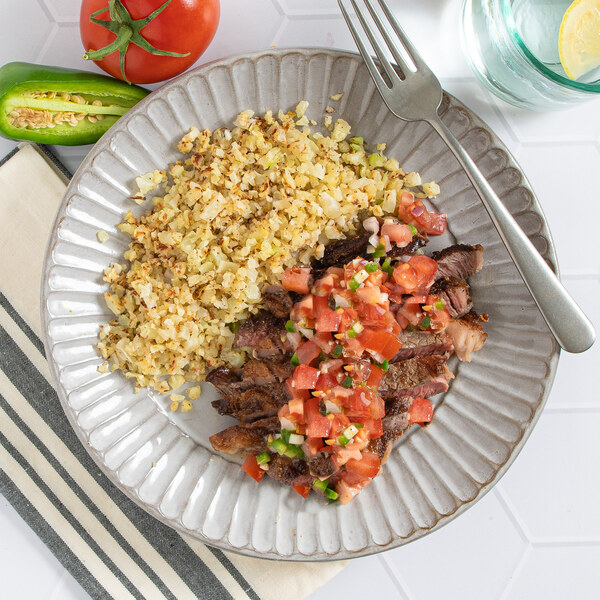 Steak with Spicy West African Tomato Salsa (Moyo) & Cauliflower Rice