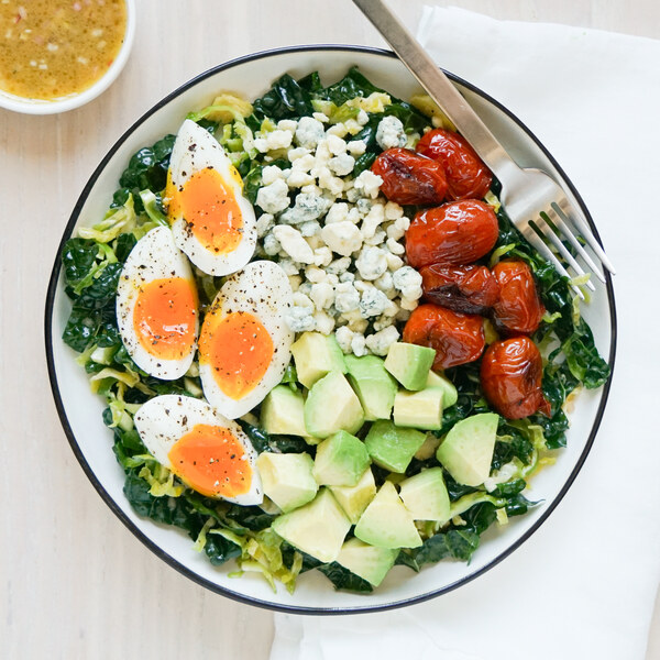 Brussels Sprout-Kale Cobb Salad with Warm Tomatoes, Blue Cheese & Egg