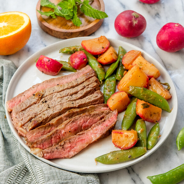 Grilled Ribeye with Mint, Orange, Snap Pea & Radish Sauté