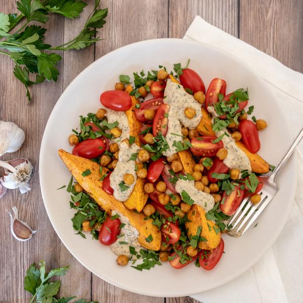 Mediterranean Sweet Potatoes with Chickpeas & Garlic-Tahini Sauce