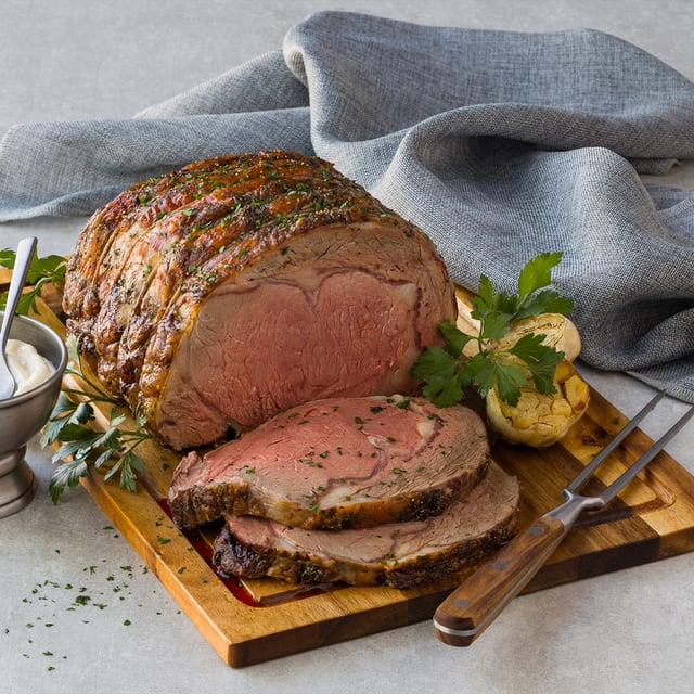 Peppered Ribeye Roast with Roasted Garlic Sauce