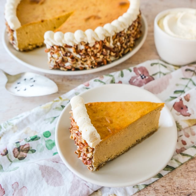Pumpkin Cheesecake with Oatmeal-Pecan Crust & Vanilla Mascarpone Whipped Cream