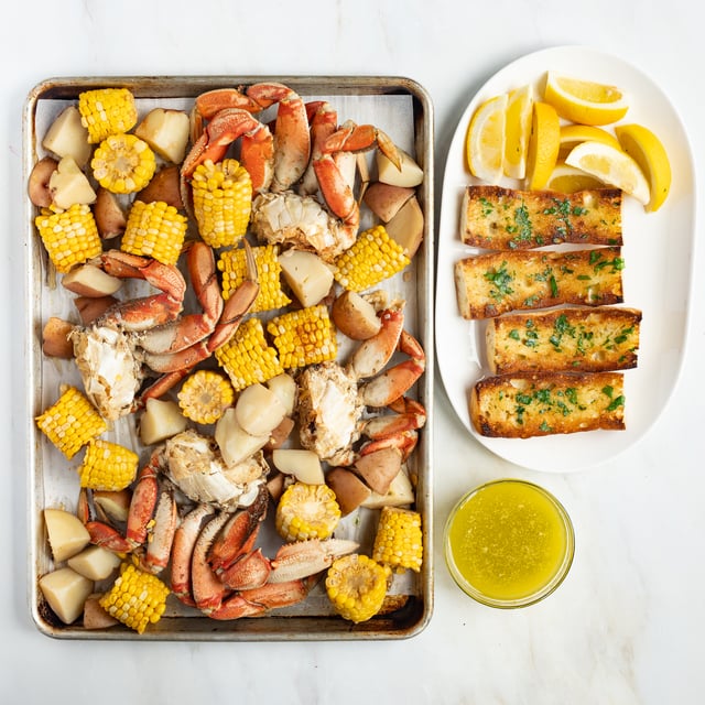 Dungeness Crab Boil with Corn, Potatoes, Toasted Baguette & Parsley Butter