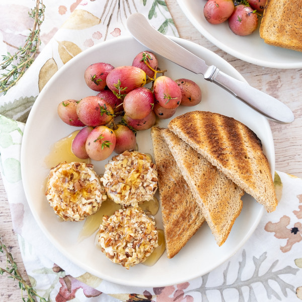 Pecan-Crusted Goat Cheese Plate with Honey & Thyme-Roasted Grapes