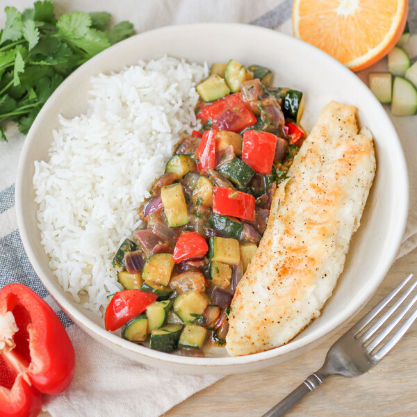 Tilapia with CilantroOrange Zucchini & Bell Pepper Sauté over Rice