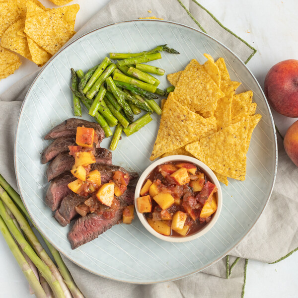 Strip Steak with Peach Salsa, Sautéed Asparagus & Tortilla Chips Vons