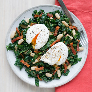 Kale Salad with Poached Eggs, Beans & Warm Bacon-Shallot Dressing