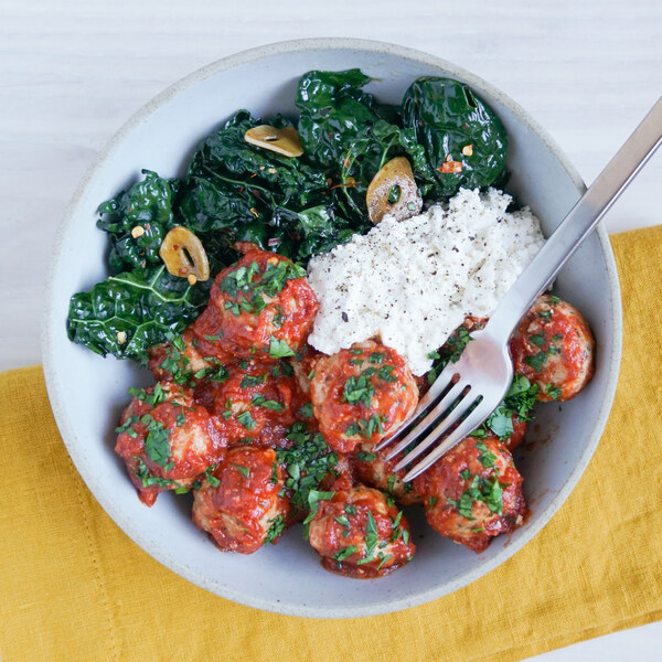 Sun-Dried Tomato Turkey Meatballs with Sautéed Garlicky Kale & Ricotta