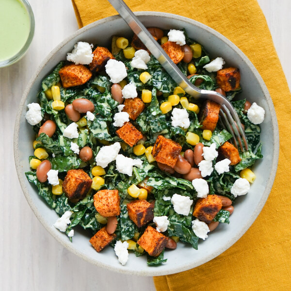 Kale Salad with Sweet Potato, Corn, Beans, Feta & Cilantro Dressing