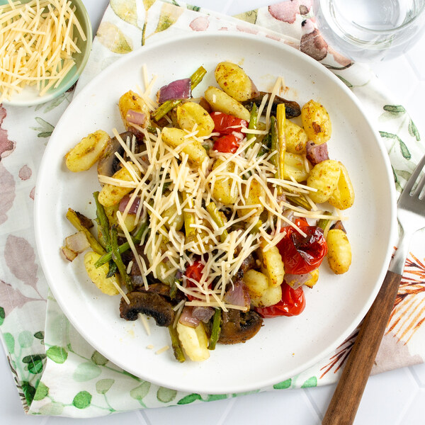 Basil Pesto Gnocchi Bake with Asparagus, Mushrooms, Tomato & Parmesan