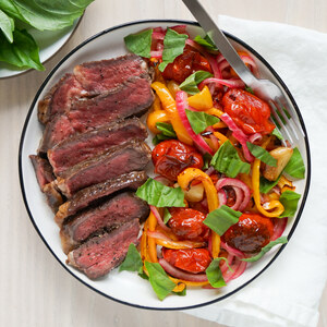 Seared Ribeye with Roasted Peppers, Tomatoes, Pickled Onions & Basil
