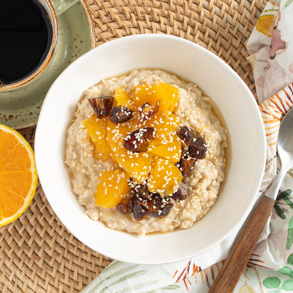TahiniCardamom Oatmeal with Oranges, Dates, Sesame Seeds & Honey