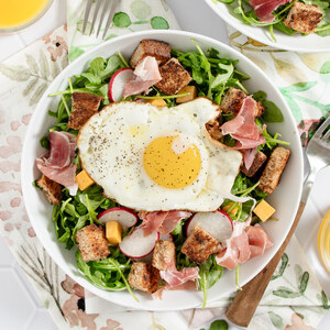 Arugula Breakfast Salad with Fried Egg, Prosciutto, Cheddar & Croutons