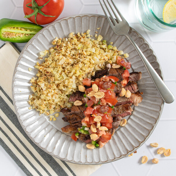 Steak with Spicy West African Tomato Salsa, Peanuts & Cauliflower Rice