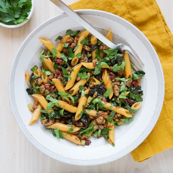 Penne with Pork Sausage, Caramelized Onion, Fennel & Swiss Chard