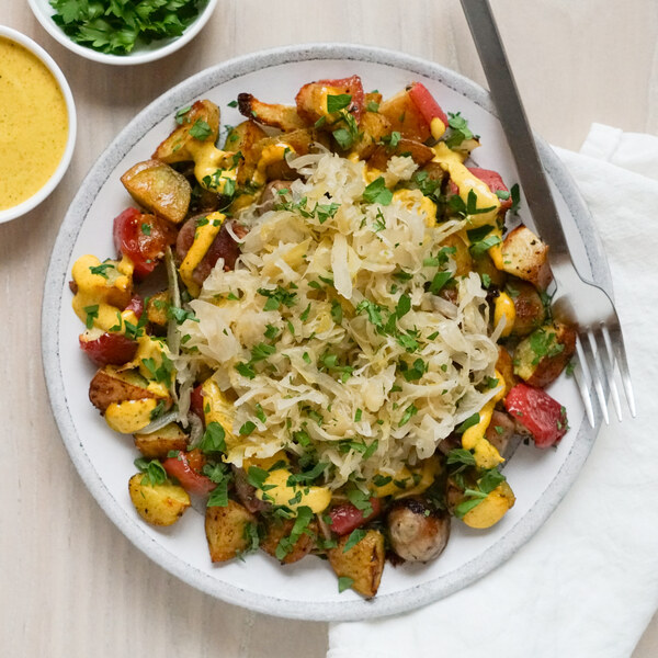 German-Style Sausage Bake with Potato, Apple, Sauerkraut & Curry Mayo