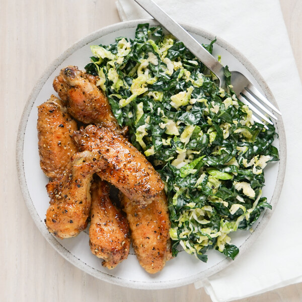 Sticky Lemon-Pepper Wings with Creamy Kale & Brussels Sprout Salad
